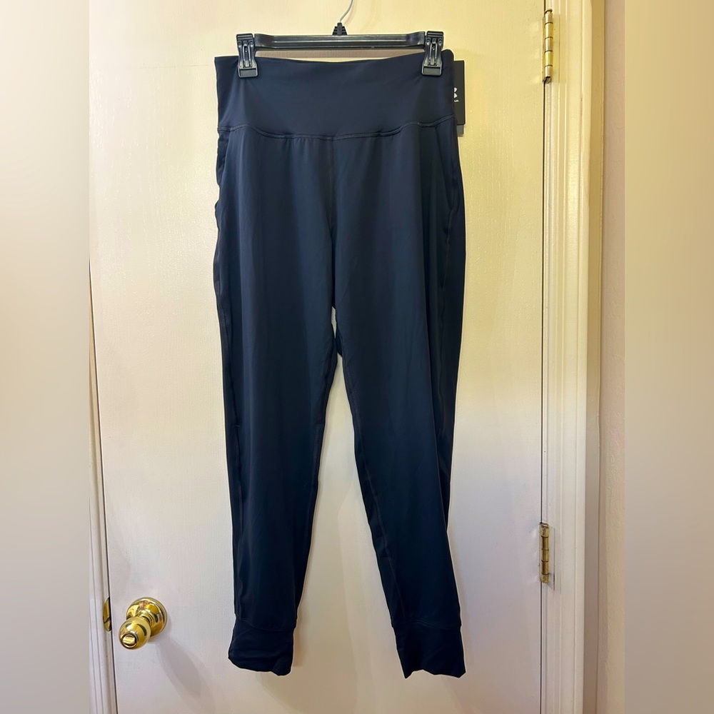 Under Armour women’s pants. With pockets and cuff.